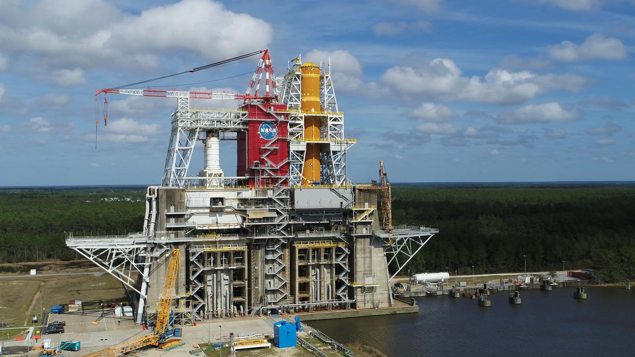 A NASA drone photo offers a bird’s-eye view of the B-2 Test Stand at NASA’s Stennis Space Center with the first flight core stage for NASA’s new Space Launch System (SLS) installed for Green Run testing. The SLS core stage is undergoing a series of tests on its integrated systems prior to its use on the Artemis I mission. NASA is building SLS to return humans, including the first woman, to the Moon as part of the Artemis program and to prepare for eventual missions to Mars. The Green Run series at Stennis culminates with a hot fire of the core stage’s four RS-25 engines, just as during an actual launch.